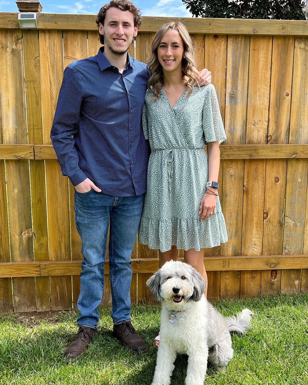 mini sheepadoodle and couple